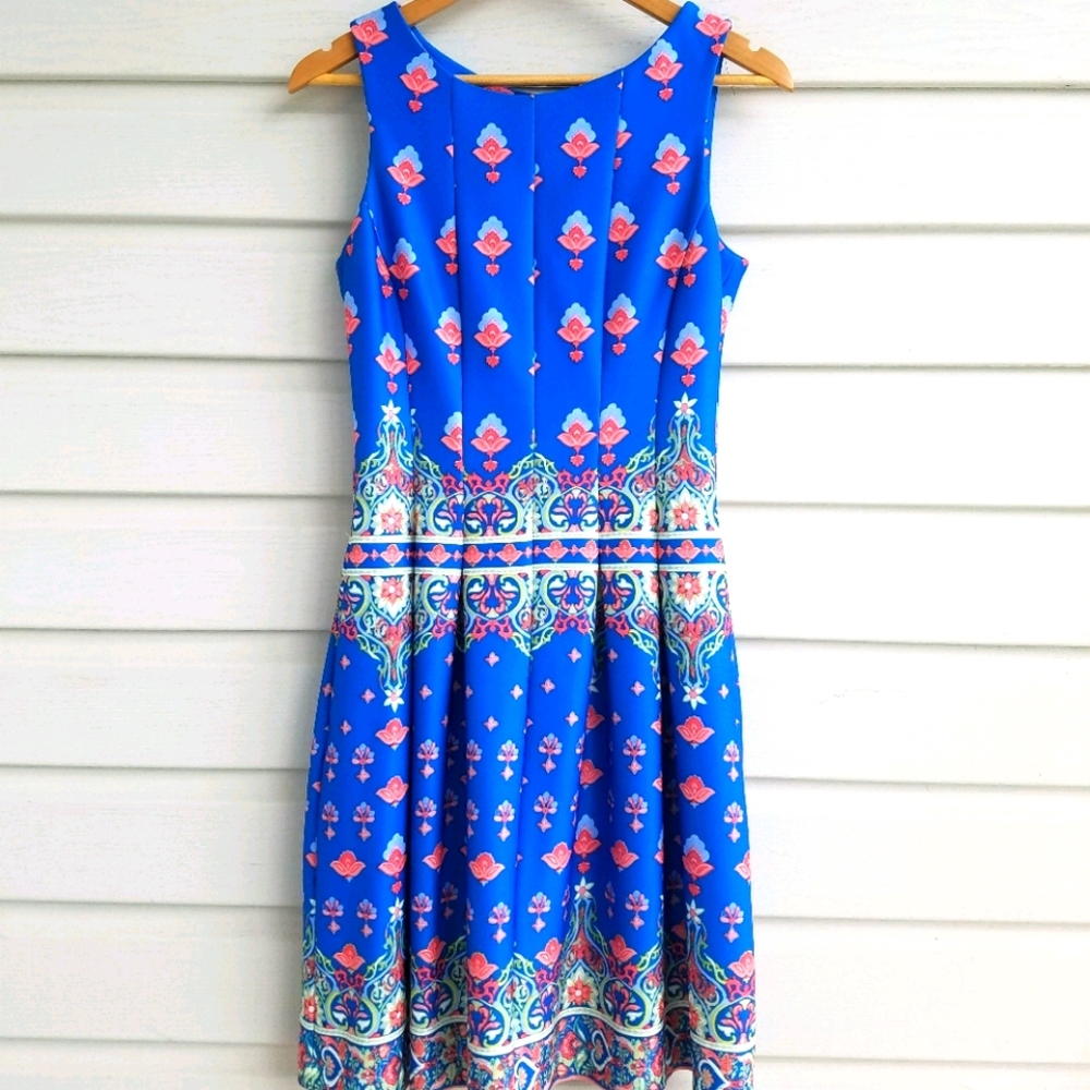 Gabby Skye Blue Form Bodice Fitted Pleated Dress.